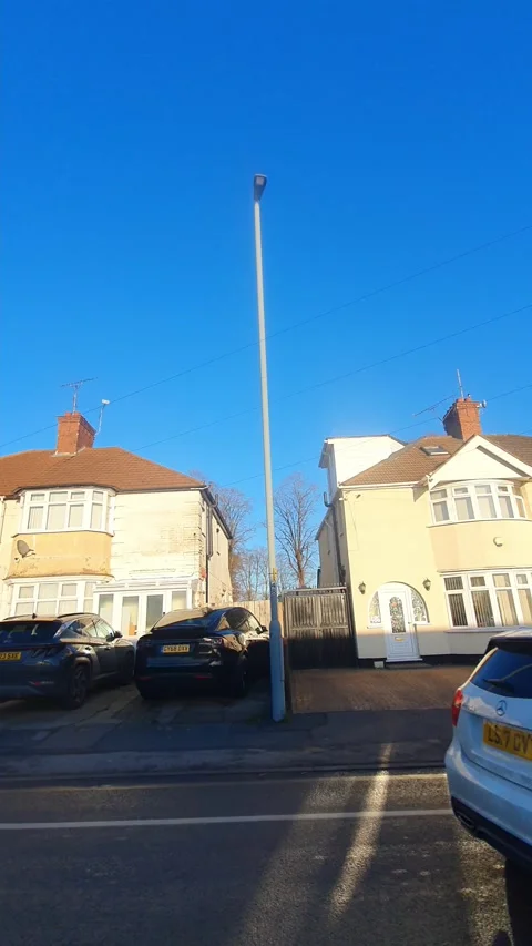 Wide Angle Vertical Footage of British Urban City Streets During Car Drive Vídeo Stock 327463003