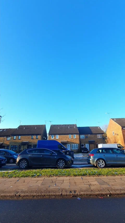 Wide Angle Vertical Footage of British Urban City Streets During Car Drive Stock Footage 327463520