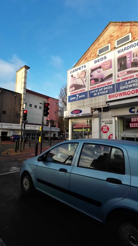 Wide Angle Vertical Footage of British Urban City Streets During Car Drive Stock Footage 327463944