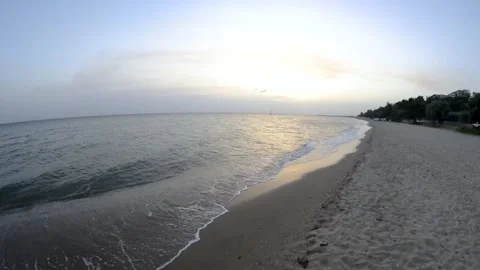 Wide angle video of a beach and a sea in a greek town Video stock 144689576