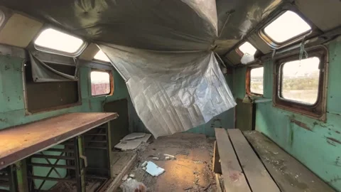 Wide angle view of abandoned and destroyed trailer, broken caravan mobile home i Stock Footage 152910593