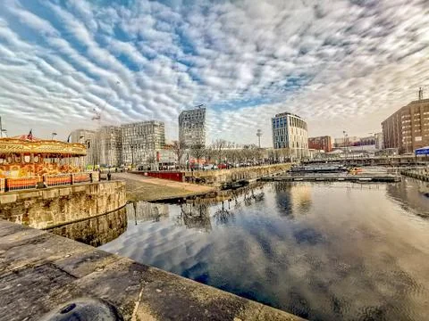 Wide angle view of Albert dock against beautiful blue sky with scattered clou Stock Photos