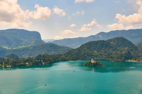 Wide angle view of Bled lake with mountains, island and pilgrimage church, view Stock Photos