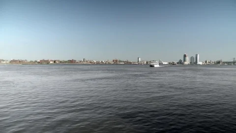 Wide angle view of Brooklyn waterfront and East River. Cruise ship approaching. Stock Footage 75263807