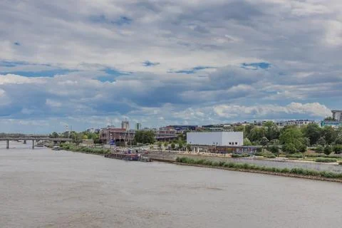 A wide-angle view captures the Vistula River's scenic bank in Warsaw, Polan.. Stock Photos