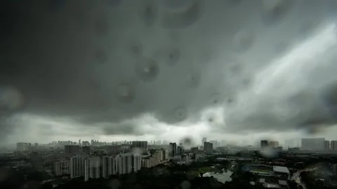 Wide angle view of city during thunderstorm, dramatic clouds with heavy rain Stock Footage 339000590