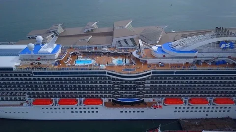 Wide angle View of Cruise ship, Camera pushing back Stock Footage 121384212