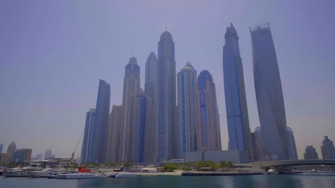 Wide angle view of Dubai Marina, panning from the right to left Stock Footage 104156972