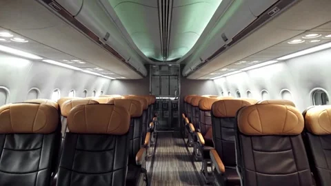 Wide-angle view of an empty modern aircraft cabin with leather seats. Stock-Footage 312193015