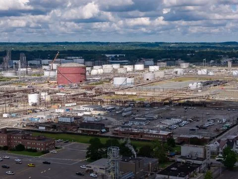 Wide angle view of expansive LNG energy plant with storage tanks Stock Photos