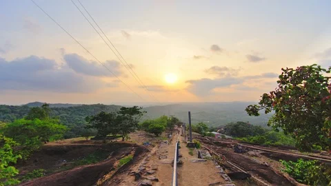 A wide angle view of forest of western ghats, sunset, time lapse Stock Footage 99532368