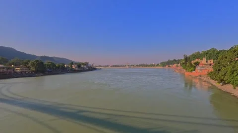 Wide-angle view of the Ganges River looking downstream from Ram Jhula towar.. Stock Footage 337641935