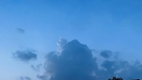 Wide Angle View of Gradient Twilight Sky and Rising Cumulus Storm Cloud Stock Photos