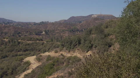 A wide-angle view of Griffith Park and Runyon Canyon Hollywood Stock Footage 319349870