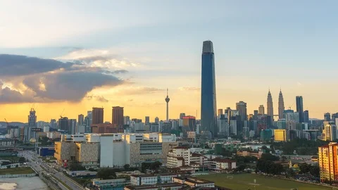 Wide Angle View From High POV Of Kuala Lumpur Cityscape Sunset. Pan Down Stock-Footage 106656020