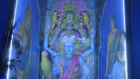 Wide angle view of kali buddha statue with four arms Stock Footage 107212523