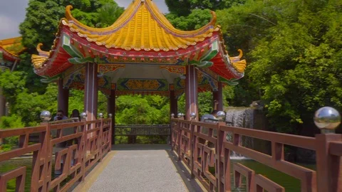 Wide angle View of kek lok si temple waterfall with tourist Stock Footage 120351832