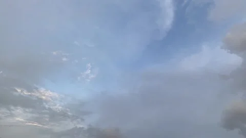 Wide Angle View of Light Blue Sky and Rolling Dark Cumulus Clouds Stock Footage 344149510