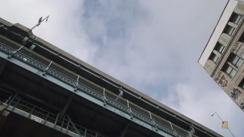 Wide angle view looking up at the Manhattan Bridge Stock Footage 321162855
