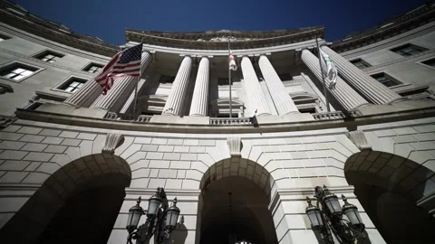 Wide angle view looking straight up at the flags and columns of the US Stock Footage 272919088