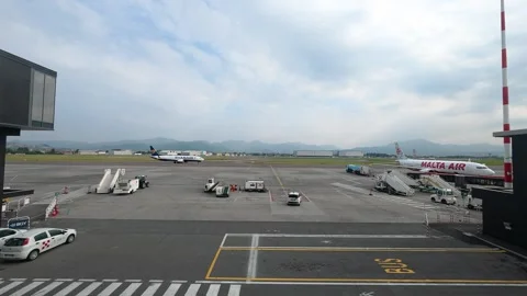 Wide Angle View of Malta Air Aircraft and Ground Operations at Modern Airport Video stock 333904422