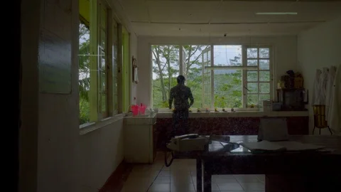Wide angle view of man in the office testing different stages of  tea processing Stock Footage 107536249