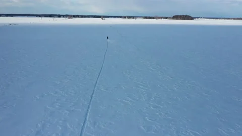 Wide angle view man on timbersled winter extreme sports Stock Footage 151045786