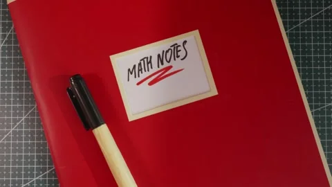 Wide angle view of Math Notes red study binder Stock Footage 341269422
