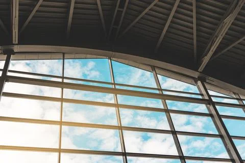 Wide angle view from modern panoramic windows in commercial building. Blue sky Stock Photos