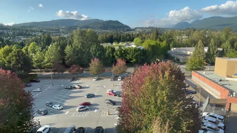 Wide-angle view of morning traffic and flowing cloud Stock Footage 250454718
