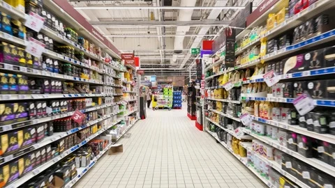 Wide Angle View Moving Through a Supermarket Coffee and Tea Aisle Stock Footage 335268122