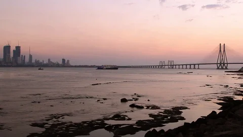 Wide angle view of Mumbai skyline and Bandra Worli Sea Link during sunset Stock Footage 108529692