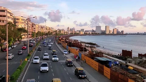 Wide angle view of the Mumbai Skyline from Marine Drive during sunset Stock Footage 222972200
