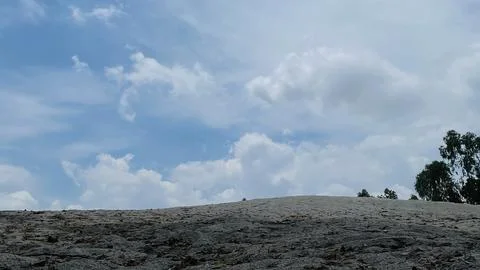Wide Angle View of Open Field Ground and Mound with Sky Horizon Stock Photos