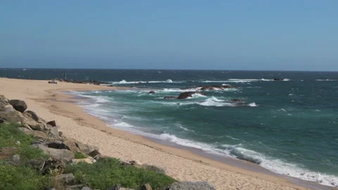 Wide angle view over beach in Vila do Conde, Portugal. Slow motion. 動画素材 132228159