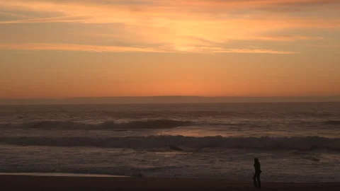 Wide angle view over beach at dusk, just after sunset Stock Footage 331754987