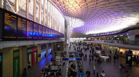 Wide angle view over Entrance hall of Kings Cross Station in London Stock Footage