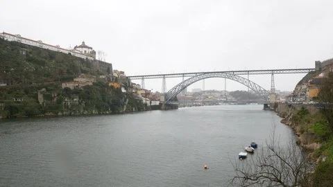 Wide angle view over River Douro in Porto, Portugal on a rainy day in spring Video stock 104268845