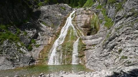 Wide angle view of a picturesque waterfall in summer Stock-Footage 260834039