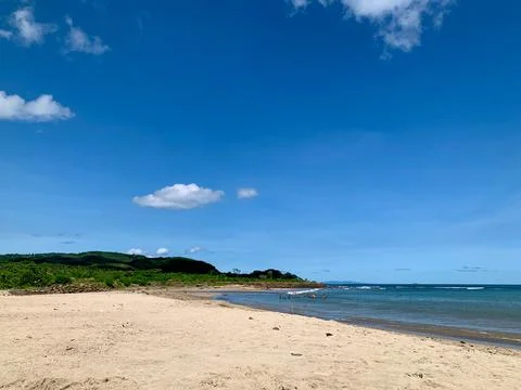 Wide Angle View of Sandy Coastline at Tanjung Lesung Bodur Beach Stock Photos