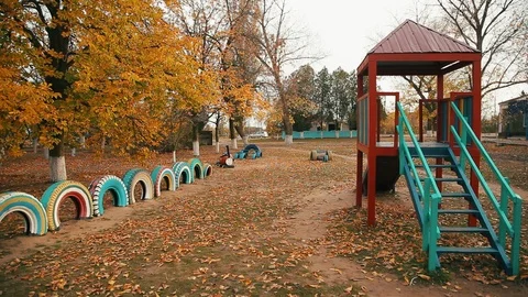 Wide angle view on self-made playground in the village 動画素材 100037802