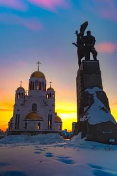 Wide angle view of soviet monument and church in Yekaterinburg at sunset Stock Photos