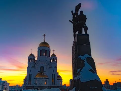 Wide angle view of soviet monument and church in Yekaterinburg at sunset Stock Photos