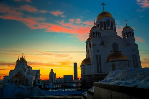 Wide angle view of soviet monument and church in Yekaterinburg at sunset Stock Photos