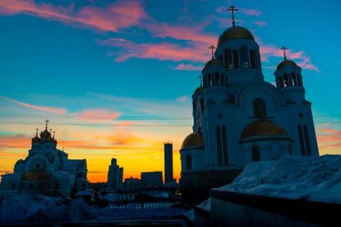 Wide angle view of soviet monument and church in Yekaterinburg at sunset Stock Photos
