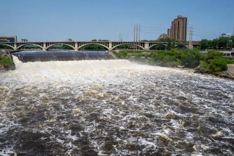Wide angle view of St. Anthony Falls in downtown Minneapolis, Central Avenue  Stock Photos