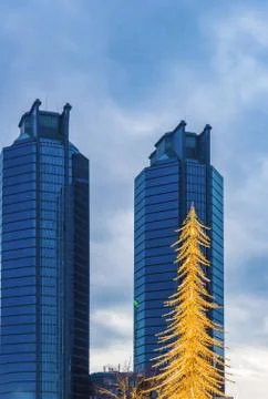 Wide angle view to steel light blue background building Stock Photos