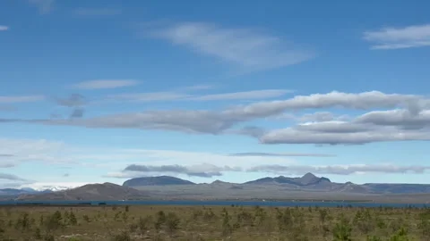 A wide-angle view of a stunning natural landscape with mountains Stock Footage 312984455