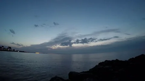 Wide angle view of a time lapse dawn at a beach shore. 動画素材 70197828