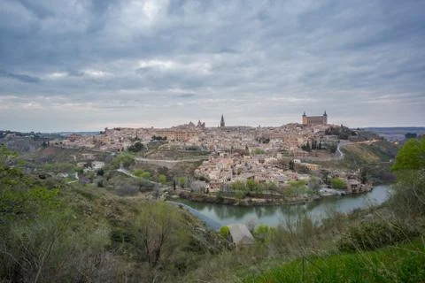 Wide angle view of Toledo with cloudy sky at sunset Foto stock